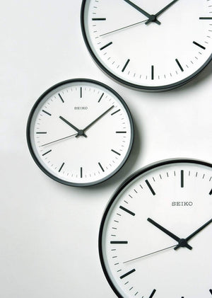 Black Analog Radio Wave Wall Clock
