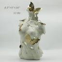 Abstract Female Bust Sculpture with Butterflies