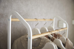 Rolling Garment Rack with Staggered Wooden Rods