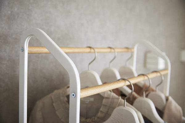 Rolling Garment Rack with Staggered Wooden Rods