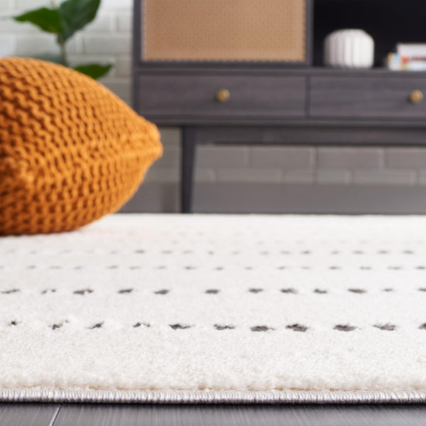 Ivory & Black Geometric Area Rug – 10' x 14' Rectangular