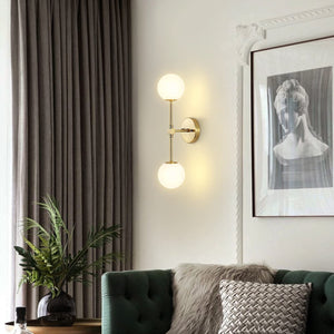 Modern Globe Glass Wall Sconce with Brass Finish