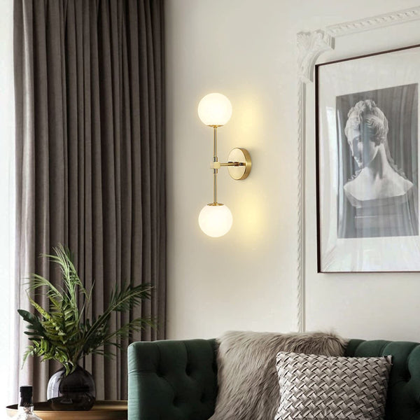 Modern Globe Glass Wall Sconce with Brass Finish