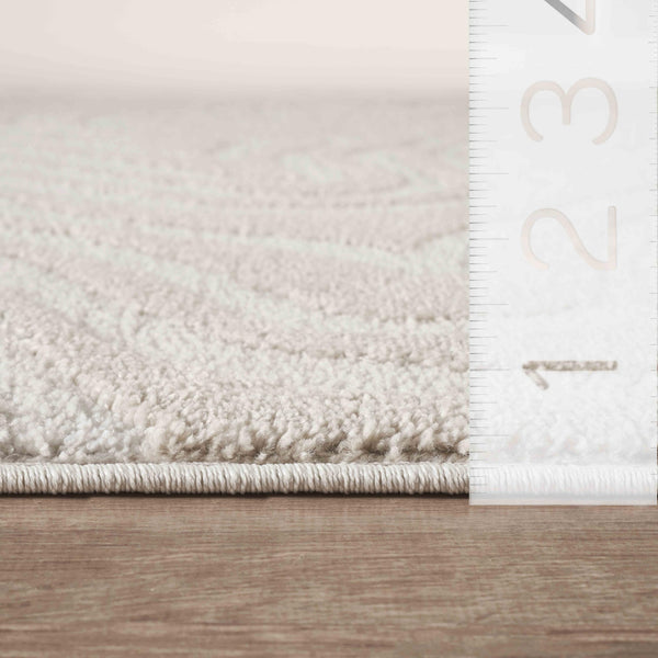 Cream Sculpted Swirl Area Rug