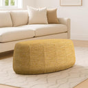 Oval Upholstered Ottoman – 40" Faux Leather
