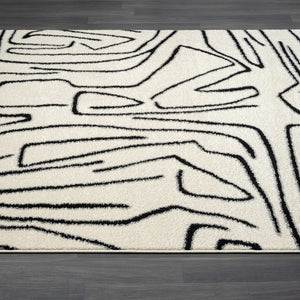 Abstract Beige & Black Area Rug – Modern Animal Print Design