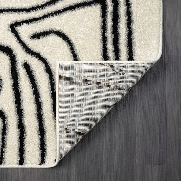 Abstract Beige & Black Area Rug – Modern Animal Print Design