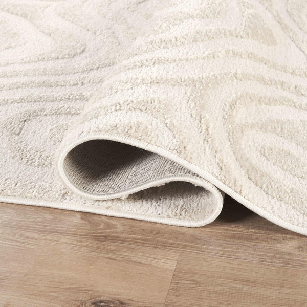 Cream Sculpted Swirl Area Rug
