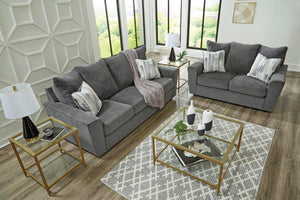 Gray Loveseat with Flared Arms & Accent Pillows